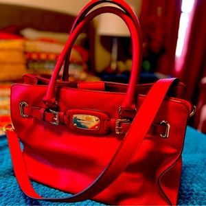 Michael Kors handbag with crossbody strap. Beautiful red leather.